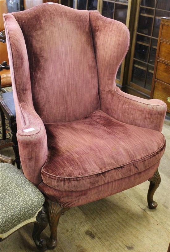 Upholstered wing armchair